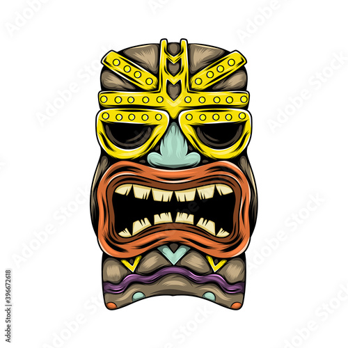The traditional tiki island mask with the gold accent and the mouth opened