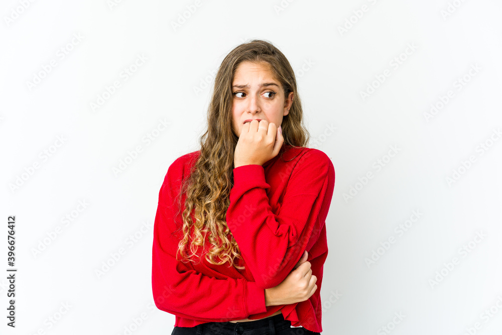 Young caucasian woman biting fingernails, nervous and very anxious. Young caucasian woman biting fingernails, nervous and very anxious.