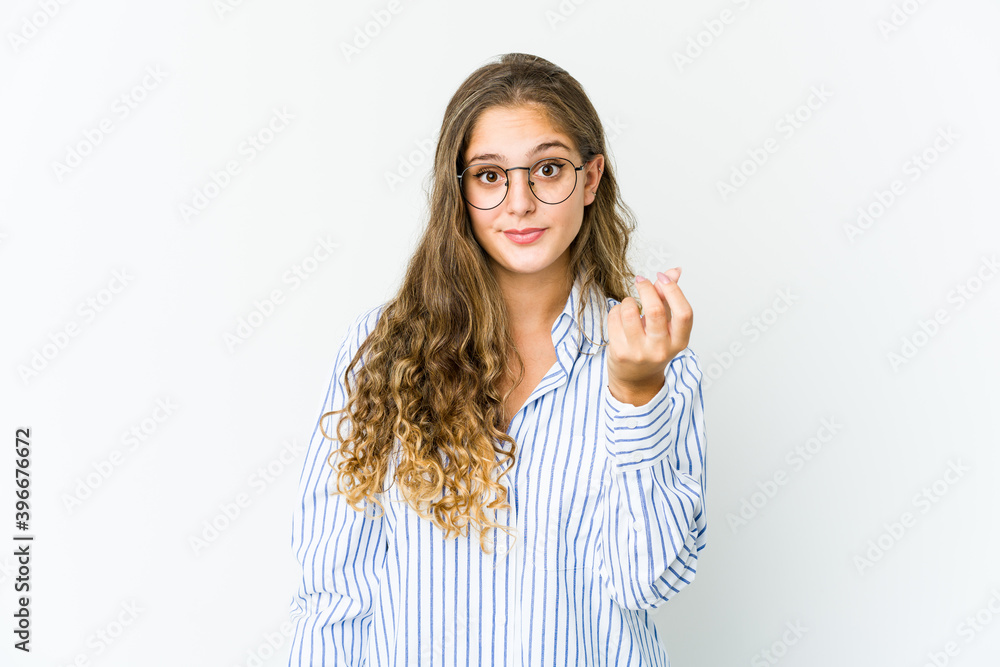 Young caucasian woman showing that she has no money. Young caucasian woman showing that she has no money.