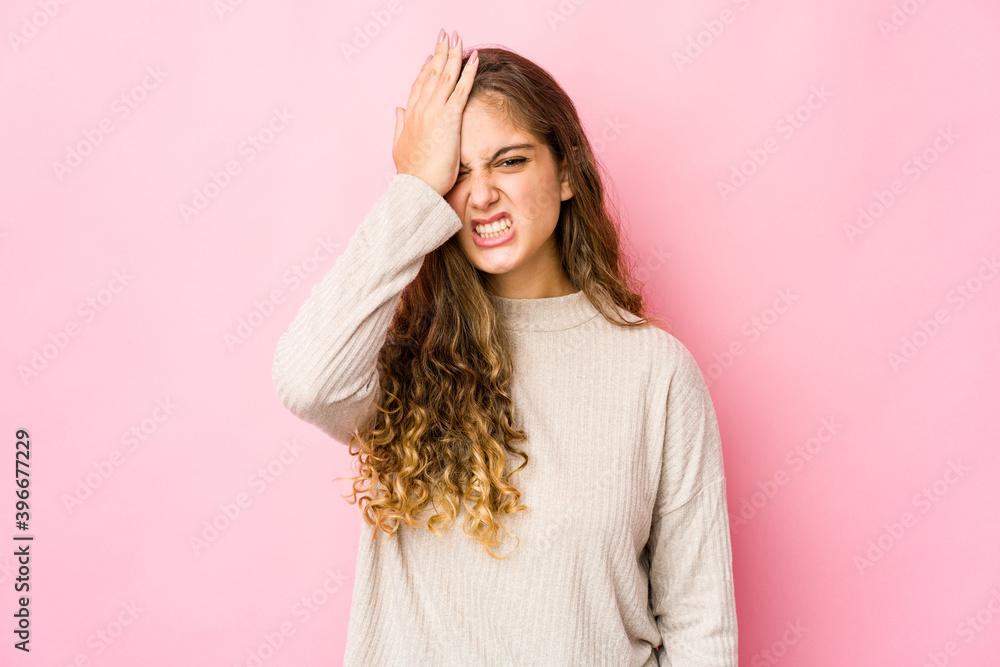 Young caucasian woman forgetting something, slapping forehead with palm and closing eyes. Young caucasian woman forgetting something, slapping forehead with palm and closing eyes.