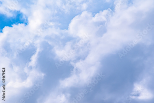 Cumulus clouds in a blue sky