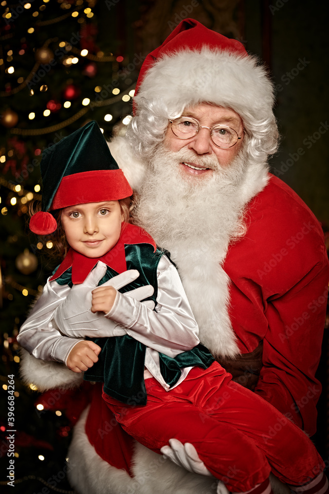 elf with Santa Claus elf with Santa Claus