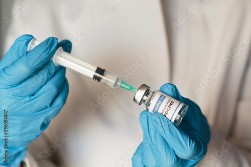 Doctor preparing Coronavirus or Covid-19 vaccine