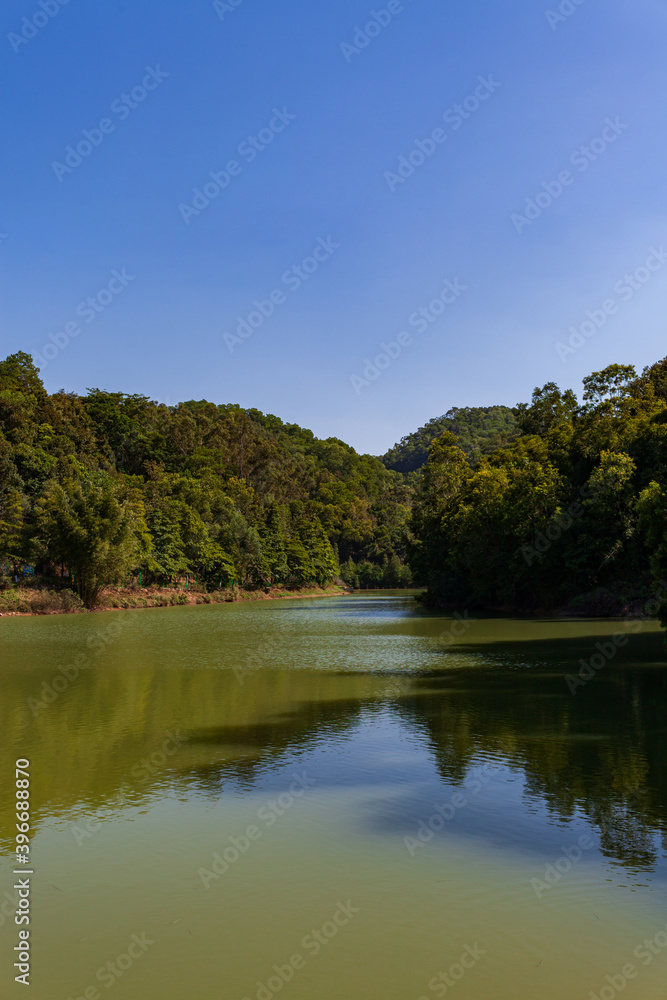 Landscape of a lake, Country Park, Blue sky and white clouds.