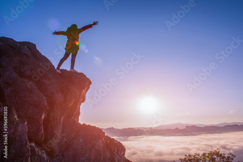 Obraz na plátně A beautiful woman standing on a mountain at Phu Pha Mok Ban Jabo in Mae Hong Son Province, Thailand
