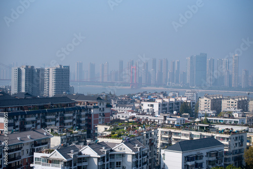 Aerial view of Wuhan city. Wuhan skyline and Yangtze river with supertall skyscraper under construction in Wuhan Hubei China.