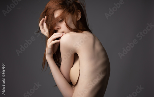 beautiful woman bare shoulders cropped view luxury Studio Model photo