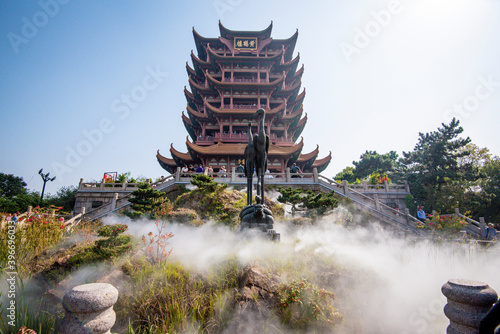 Fényképezés Yellow Crane Tower against blue sky in Snake Hill, Wuhan, China