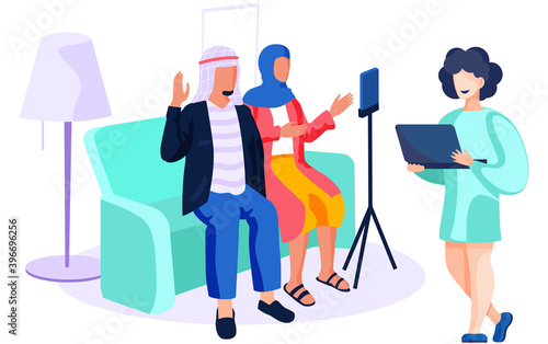 People of arab nationality give interviews on camera. Woman with laptop in hands is recording a video massage from people and smiling. Man and woman are broadcasting online with using a phone