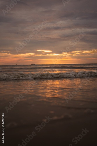 Beautiful sunrise in the sea on the beach © narongcp