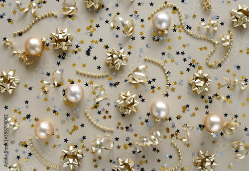 Christmas background . New Year decorations pattern in gold colors on gold ba...