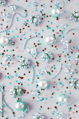 Christmas background . New Year decorations pattern  in mint colors on silver...