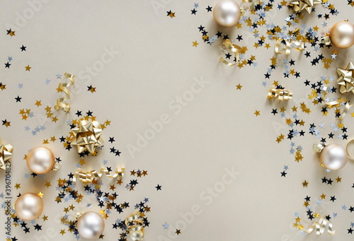 Christmas background . New Year decorations in gold colors frame on gold back...