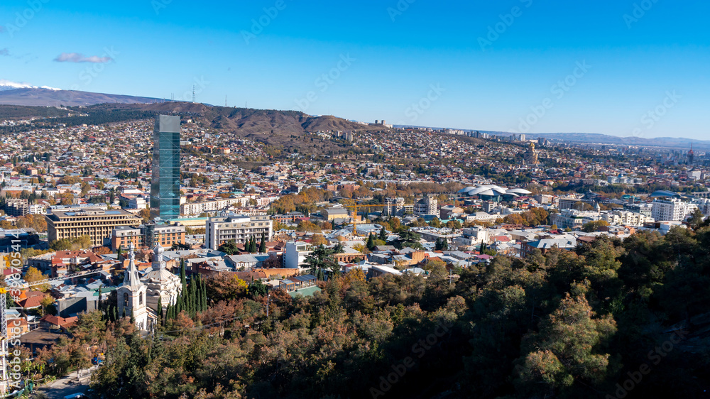 Panorama view of Tbilisi. Modern landmark - high-rise hotel