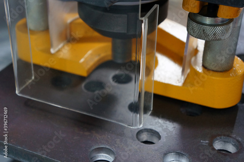 Photography An acrylic cover safety guard in the metal machine in industry plant
