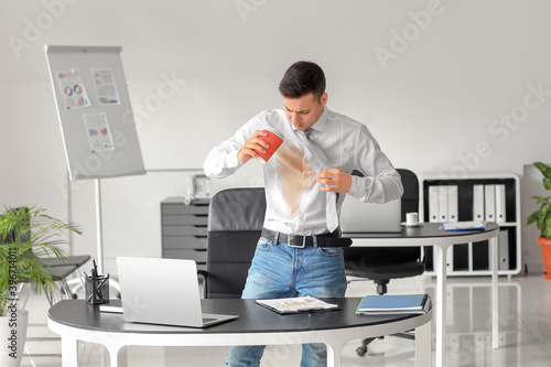 Stressed young businessman ...