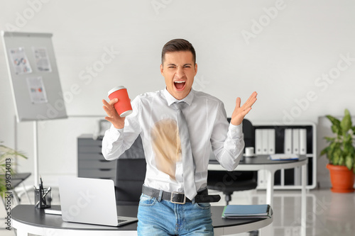 Screaming young businessman...