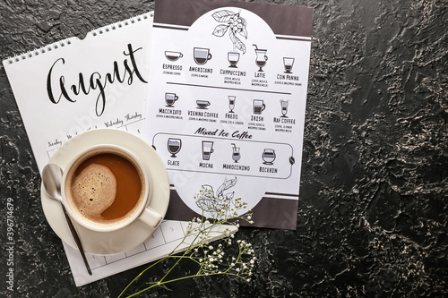 Cup of hot coffee and menu ...