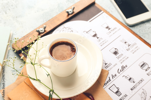 Cup of hot coffee on table ...