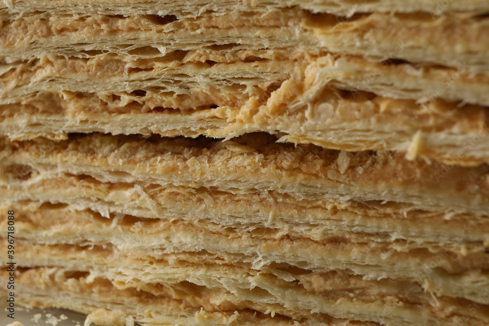 Delicious Napoleon cake on whole background, close up Delicious Napoleon cake on whole background, close up