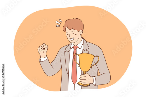 Success, leadership, business development concept. Happy young businessman cartoon character holding golden trophy and feeling champion with successful project or deal. Victory, happiness, power