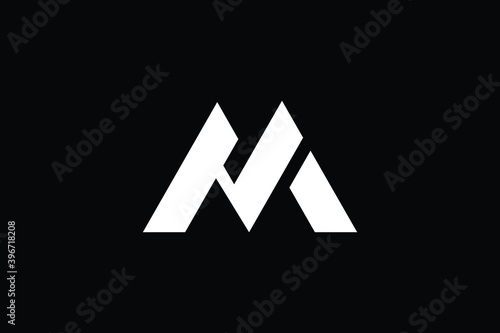 HM logo letter design on luxury background. MH logo monogram initials letter concept. HM icon logo design. MH elegant and Professional letter icon design on black background. M H HM MH