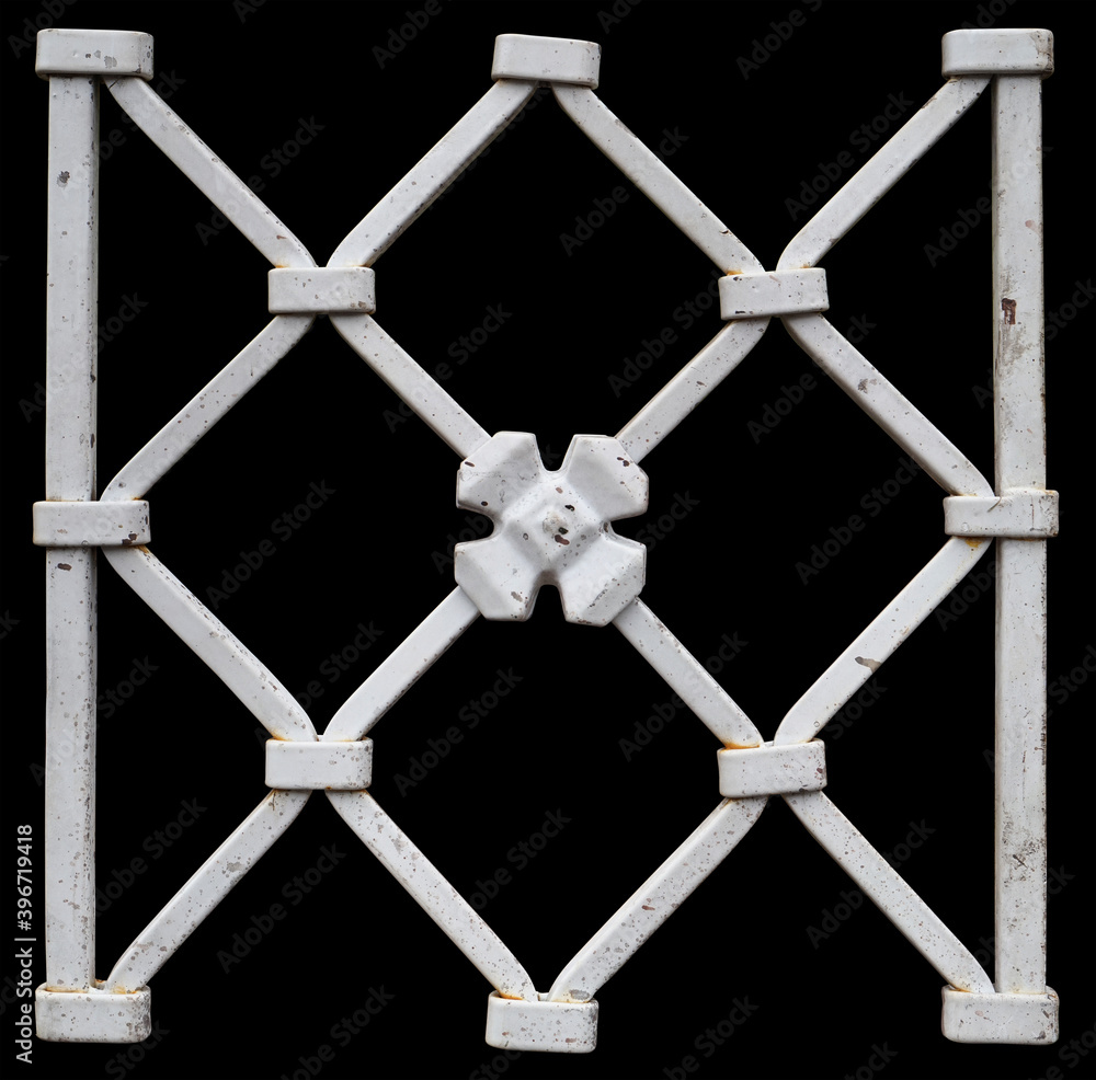 Fragment of a homemade metal fence in white isolated Fragment of a homemade metal fence in white isolated
