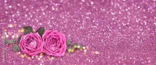 Pink holiday bokeh background with rose flowers
