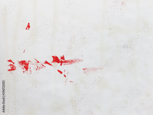 Old dirty paper background. Texture of used vintage white paper with spots and blots