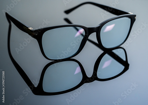 Blue light blocking glasses. Black frame glasses for filtering blue light from the computer. Prevent Computer Vision Syndrome. Eye protection. Cphthalmology concept