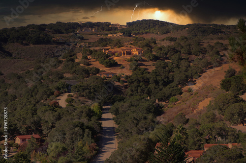Photoshop landscape of roads, hills at sunset.