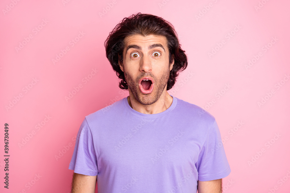 Close up photo of terrified person staring open mouth purple clothing isolated on pastel pink color background Close up photo of terrified person staring open mouth purple clothing isolated on pastel pink color background