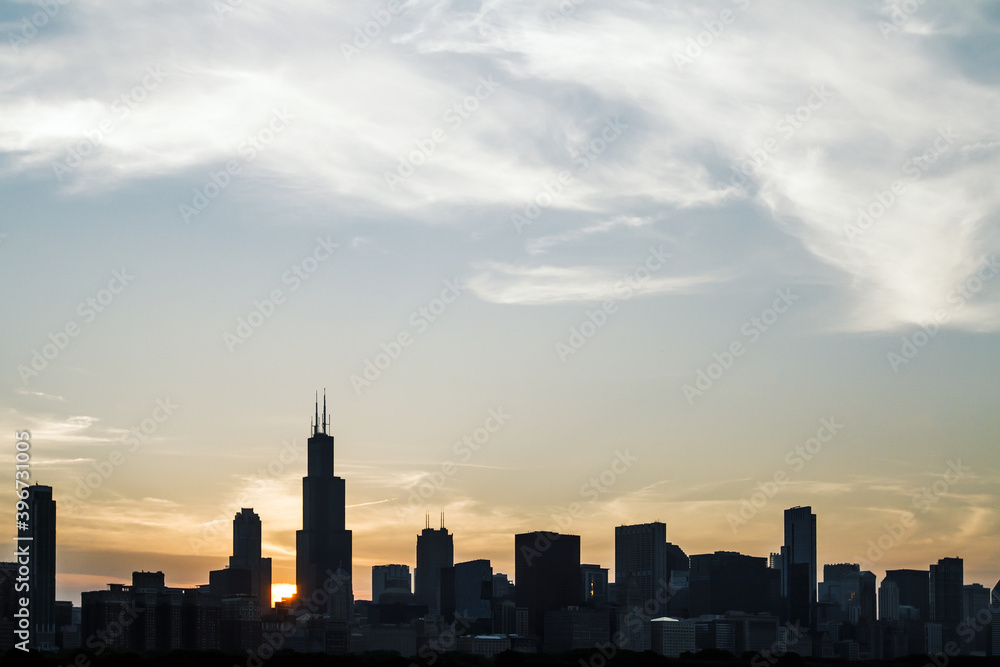 Beautiful Chicago cityscape at sunset, backlit