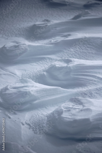 Footsteps left in the snow after a storm
