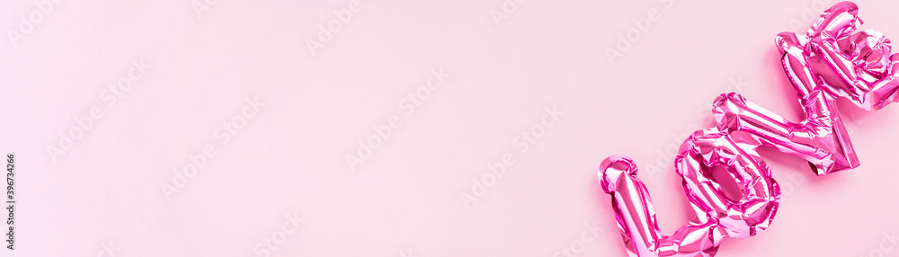 Love concept. Inflatable pink balloon with letters Love concept. Inflatable pink balloon with letters