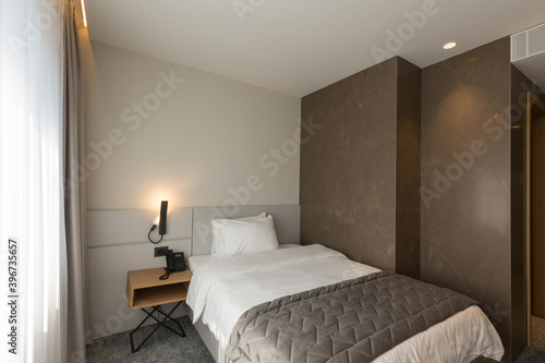 Interior of a luxury master bed hotel bedroom © rilueda