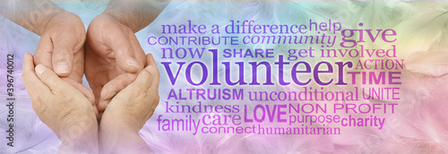 Volunteer Carer Word Cloud - female hands cupped around male cupped hands next to a VOLUNTEER word cloud on a multicoloured rainbow background
