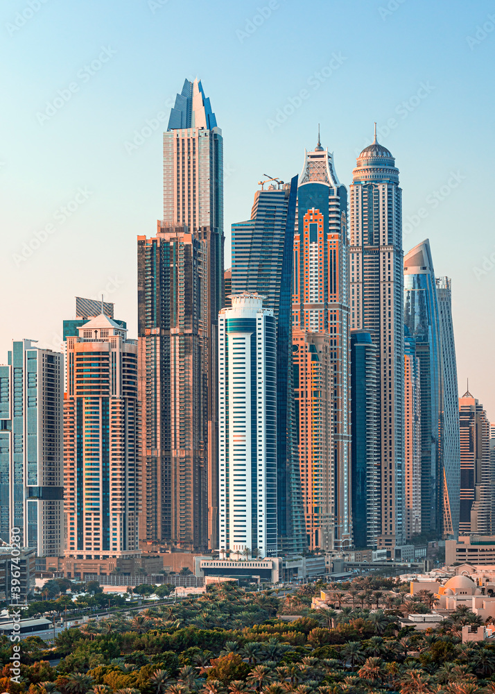 Lux TOP Dubai Marina skyscrapers, port with luxury yachts and marina promenade,Dubai,United Arab Emirates