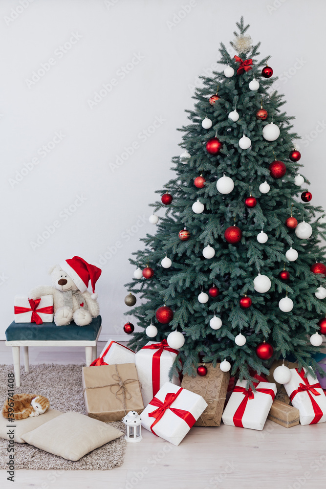 Decor new year interior beautiful Christmas tree with gifts