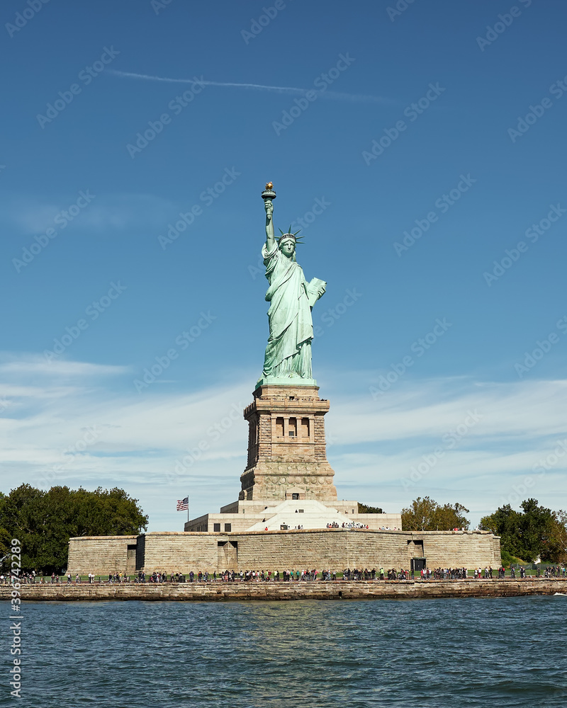 Beautiful view of Liberty Island in New York Bay, where you can see the famous Statue of Liberty,  and the Hudson River 