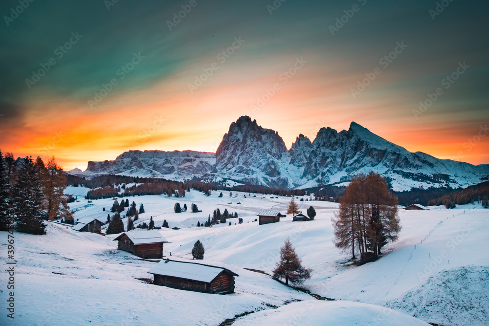 Amazing winter landscape at sunset in Alpe di Siusi, Dolomites, Italy - winter holidays destination