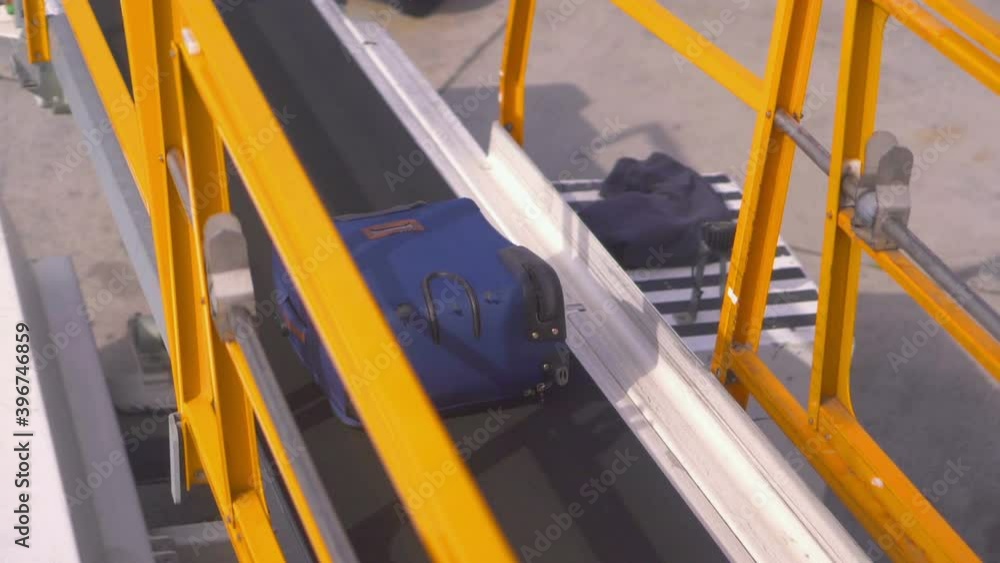 Loading luggages to the airplane in slow motion 180fps Loading luggages to the airplane in slow motion 180fps