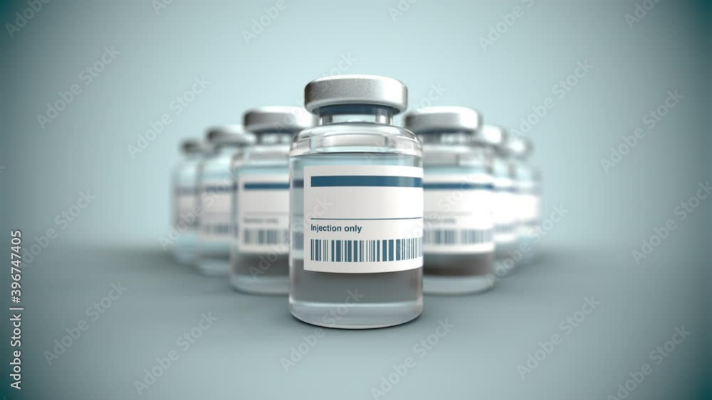 Photo-real 3D render of vaccine vials slowly drifting into focus, with barcode on label. Photo-real 3D render of vaccine vials slowly drifting into focus, with barcode on label.