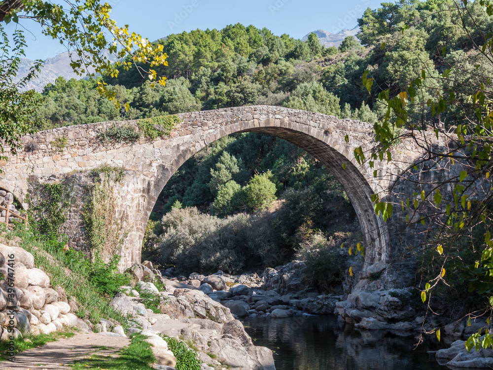Roman bridge over the Alardos gorge river. Madrigal de la Vera, Caceres, Extremadura, Spain