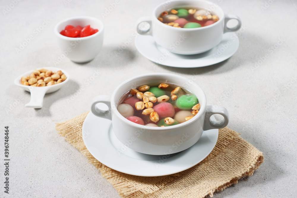 Wedang Ronde, an Javanese traditional dessert made of glutinous rice flour filled with peanut in ginger syrup Wedang Ronde, an Javanese traditional dessert made of glutinous rice flour filled with peanut in ginger syrup