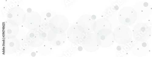Gray vector background with a pattern of circles with different diameters. Textured template for a web splash in a modern style.