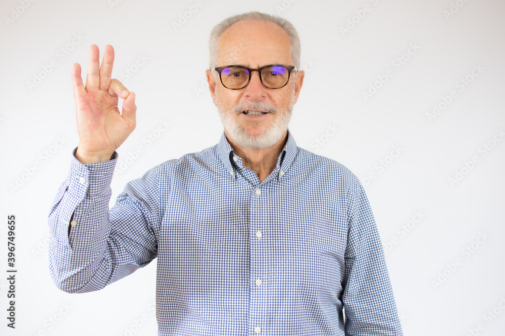 happy positive handsome old man shows Okay sign, no problems, health is Okay everything is okay. close up portrait. isolated white background. happiness, success concept. happy positive handsome old man shows Okay sign, no problems, health is Okay everything is okay. close up portrait. isolated white background. happiness, success concept.
