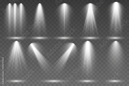 The spotlight shines on the stage. ight from a lamp or spotlight. lighted scene. Vector illustration EPS10