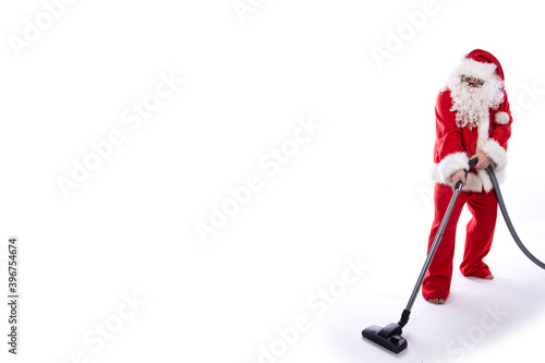 Santa Claus is cleaning the house. White background.