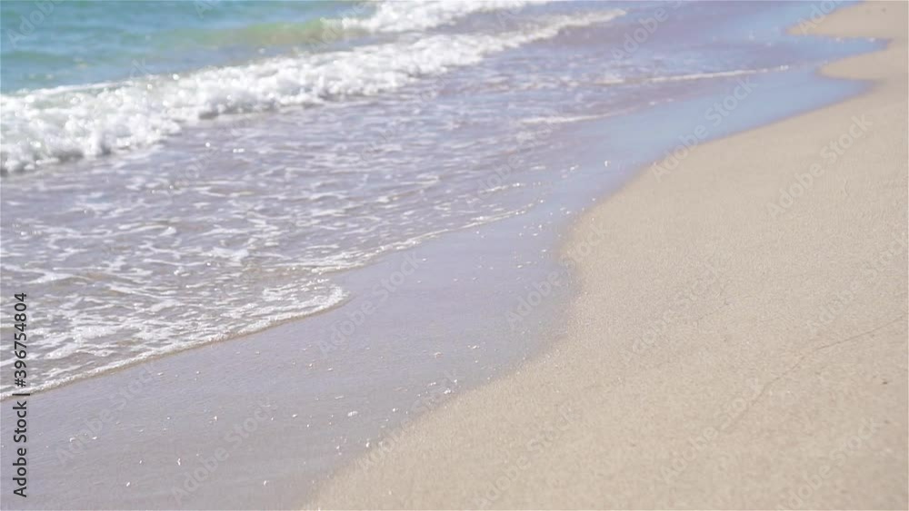 Idyllic tropical beach in Caribbean with white sand, turquoise ocean water and blue sky Idyllic tropical beach in Caribbean with white sand, turquoise ocean water and blue sky